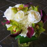 white rose, hydrangea, purple mini calla lily and green cymbidium bridal bouquet